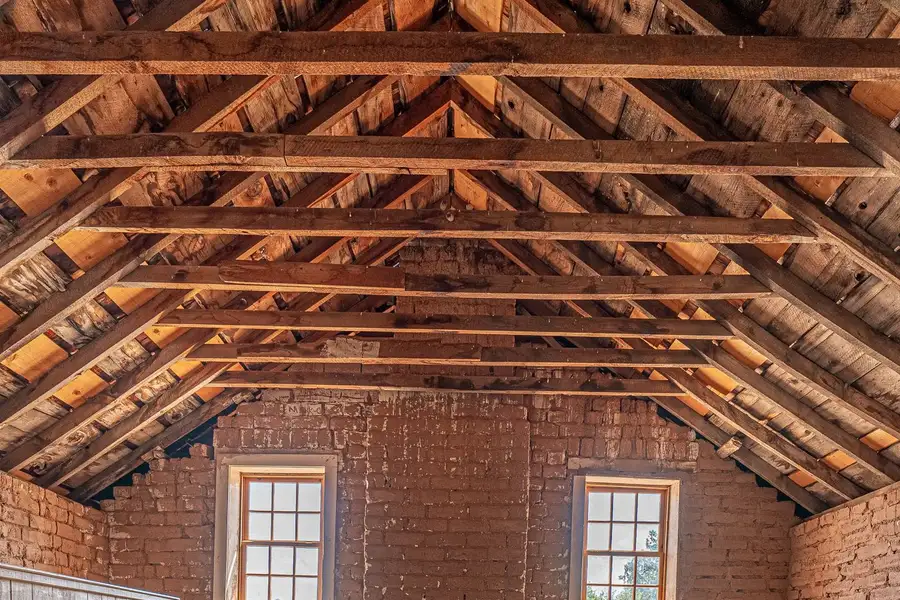 Bright attic interior with exposed rafters