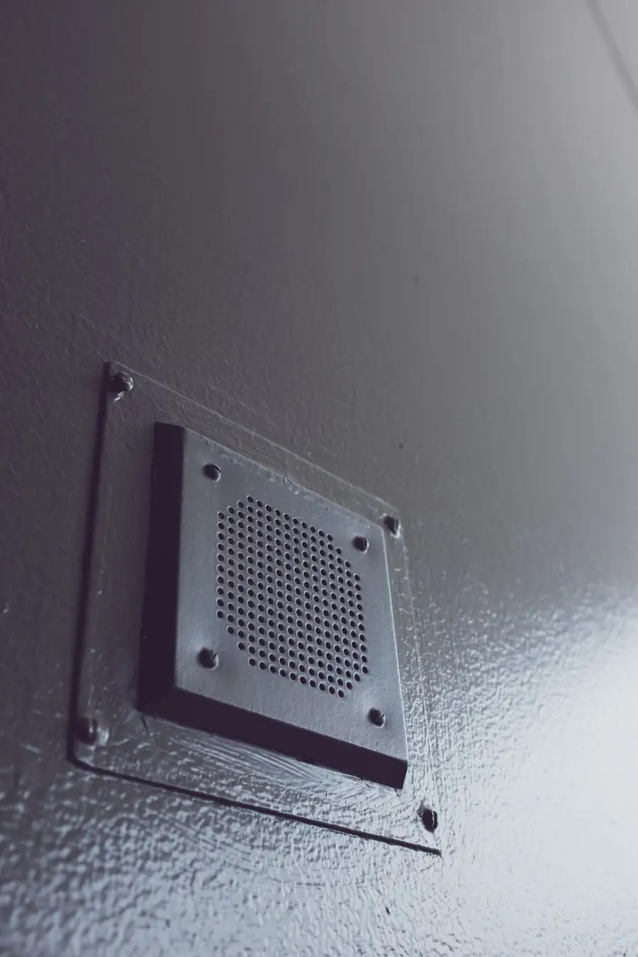 Metal vent cover fitted on an exterior wall
